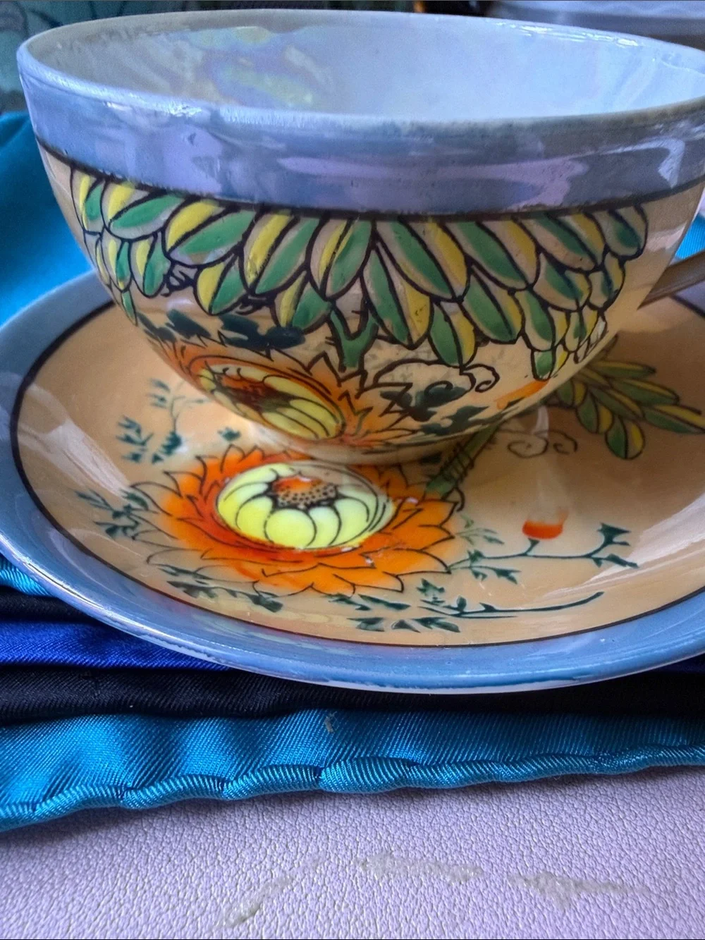 Vintage ca 1940-50’s  made in Japan orange flower lusterware tea cup & saucer